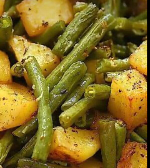 A close up of potatoes and green beans