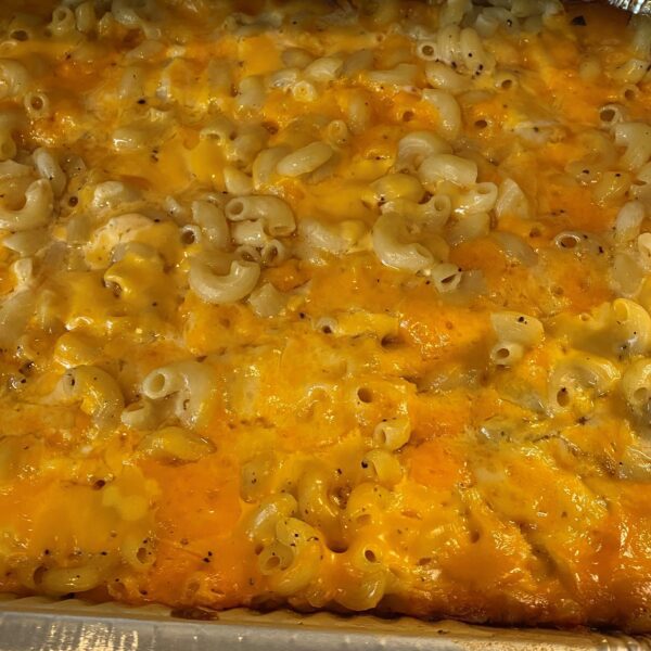 A close up of macaroni and cheese in a pan