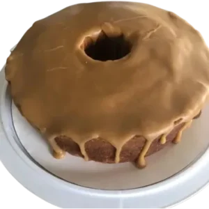 A cake with caramel frosting on top of it.