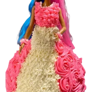 A barbie doll in a pink dress with white roses.